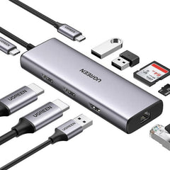 A Photo Of UGreen 9-in-1 USB-C Hub Adapter | Dual 4K HDMI, USB 3.0, Ethernet, SD/TF Card Reader | 60W PD Charging