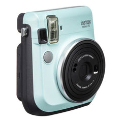 A Photo Of Fujifilm Instax Mini 70 Instant Film Camera - Icy Mint, Selfie-Ready with Macro Mode & Automatic Exposure
