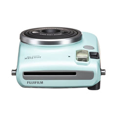 A Photo Of Fujifilm Instax Mini 70 Instant Film Camera - Icy Mint, Selfie-Ready with Macro Mode & Automatic Exposure