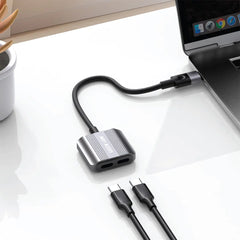 A Photo Of Green Lion 2-in-1 Type-C Splitter Adapter – Dual Type-C Ports for Charging and Audio – Gray