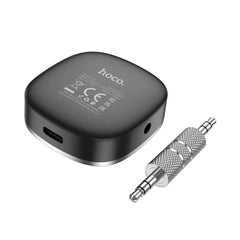 A Photo Of Hoco E80 In-Car AUX Bluetooth Receiver for Seamless Audio Streaming