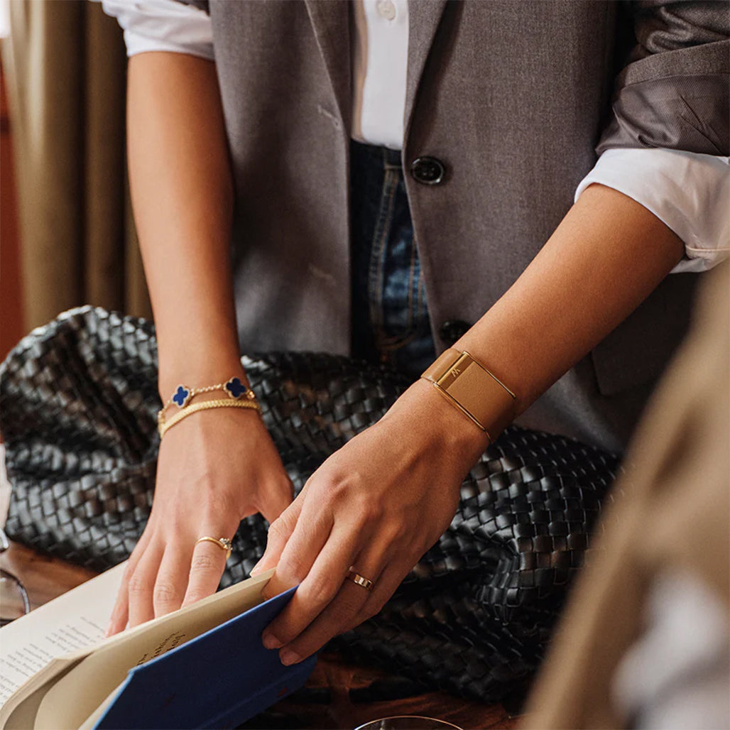 A Photo Of Whoop MG LeatherLuxe Bands - Camel with Gold (Large)