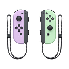 A Photo Of Nintendo Joy-Con (L/R) Pastel Purple and Pastel Green Controllers