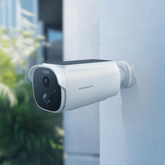 A Photo Of Powerology Built-in Solar Outdoor Camera - White | 2K HD, IR Night Vision, and Solar-Powered Security