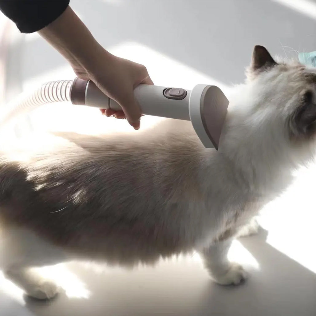 A Photo Of Porodo Lifestyle Pet Grooming Kit with Vacuum – Powerful 13500Pa Suction, Low Noise, White