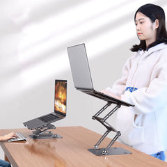 A Photo Of Adjustable Three-Layer Laptop Stand with Folding Storage and Cooling Base – Portable Carbon Steel Vertical Lifting Stand