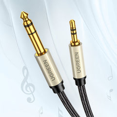 A Photo Of UGreen AV127 3.5mm to 6.35mm Audio Cable | Gold-Plated TRS Mini Jack | 1 Meter Nylon Braided Cable