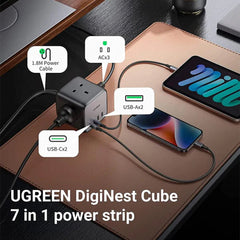 A Photo Of UGreen 65W USB-C GaN Charging Station - 7-Port Desktop Charger with 3 AC Outlets, 2 USB-C Ports, 2 USB-A Ports, 1.8M Extension Cord