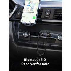 A Photo Of UGreen 70601 Bluetooth Aux Adapter – Car Aux Bluetooth v5.0 Receiver with 3.5mm Jack and Built-in Microphone for Stereo Music Streaming and Hands-Free Calls