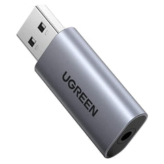 A Photo Of UGreen USB 2.0 to 3.5mm Audio Adapter – Stereo Sound for PC, Gaming Consoles, and More