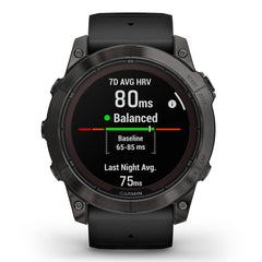 A Photo Of Garmin Fēnix® 7X Pro Sapphire Solar Edition - Titanium with Fog Gray/Ember Orange Band