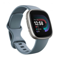 A Photo Of Fitbit Versa 4 Sports Pack - Waterfall Blue with Extra Black Band, Platinum Aluminum