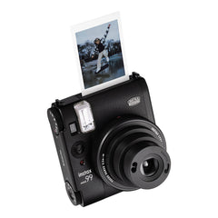 A Photo Of Fujifilm Instax Mini 99 Instant Camera - Black, Premium Analog with Color Effects and Vignette Mode