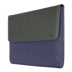 A Photo Of MagEasy MagSleeve for MacBook - Navy Leather Laptop Sleeve with Magnetic Closure