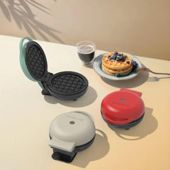 A Photo Of Nutricook Mini Waffle Maker 350-400W, Healthy Ceramic Coating, Quick Heat – Aqua Marine - NC-WM100AM
