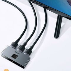 A Photo Of Baseus 4K 60Hz HDMI Splitter and Bi-Directional HDMI Switcher - 1x2/2x1 HDR HDMI Audio Adapter for PS4, TV Box, and More