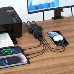 A Photo Of Green Lion 7-in-1 GaN 65W USB-C Power Strip with AC Outlets – Fast Charging Extension Hub (Black)