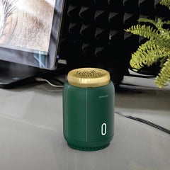 A Photo Of Green Lion Ember Bakhour Burner