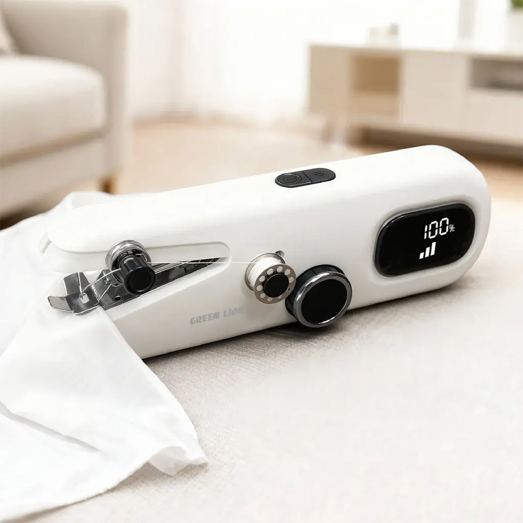 A Photo Of Green Lion Handheld Sewing Machine Portable 2000mAh