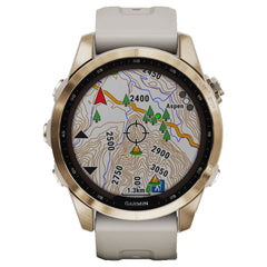 A Photo Of Garmin FĒNIX 7S Sapphire Solar - Cream Gold Titanium With Cream Heathered Nylon Band