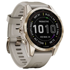 A Photo Of Garmin FĒNIX 7S Sapphire Solar - Cream Gold Titanium With Cream Heathered Nylon Band